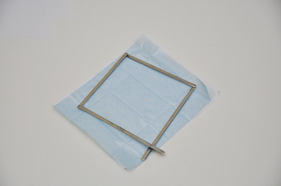 Parcel Paper Weight and Handle