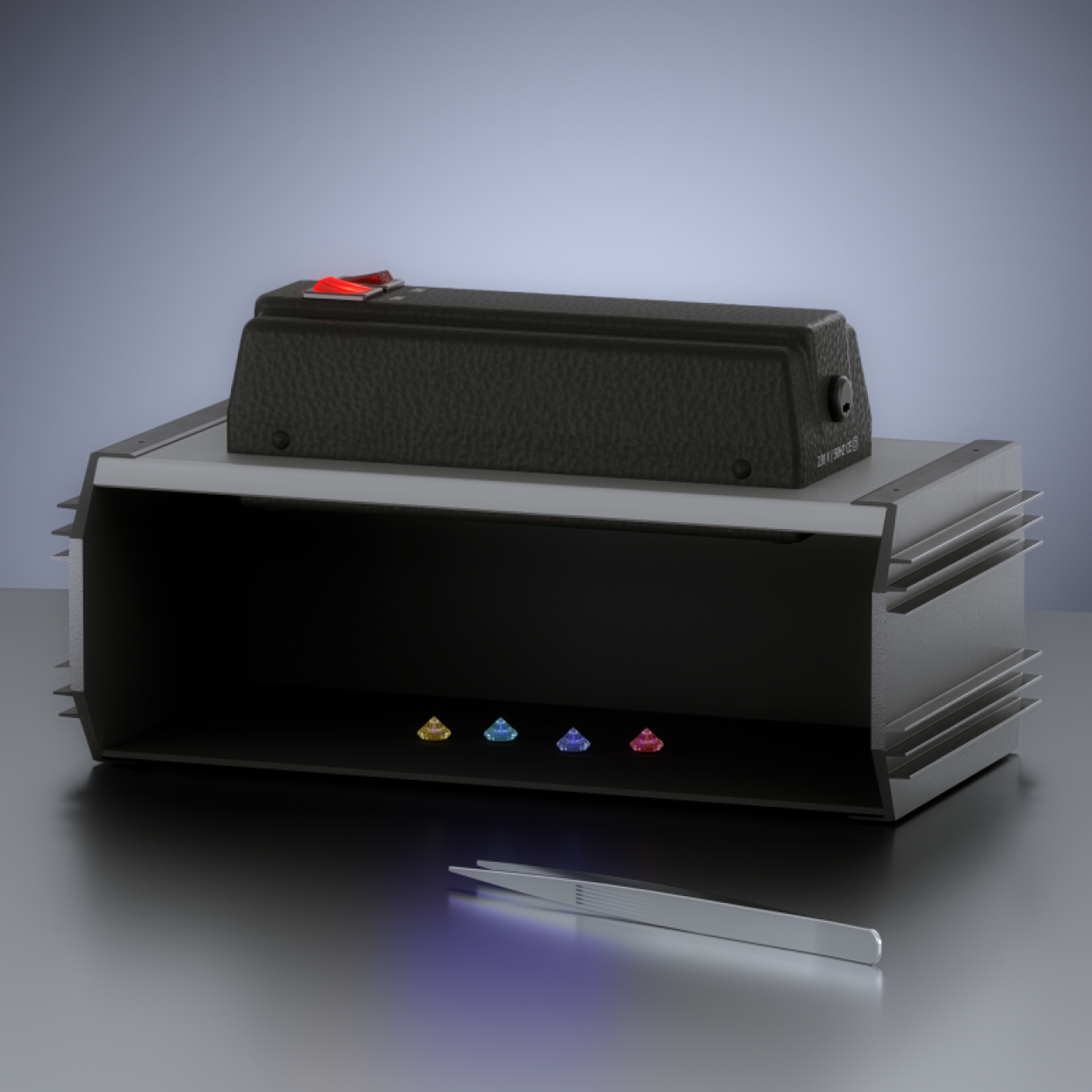 Multispec UV lamp with shortwave and longwave functions placed on a darkroom inspection box, showing fluorescent gemstones inside and tweezers in front.