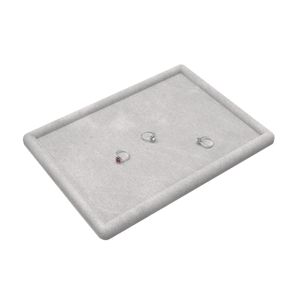 Soft velvet tray for presenting diamond rings and earrings